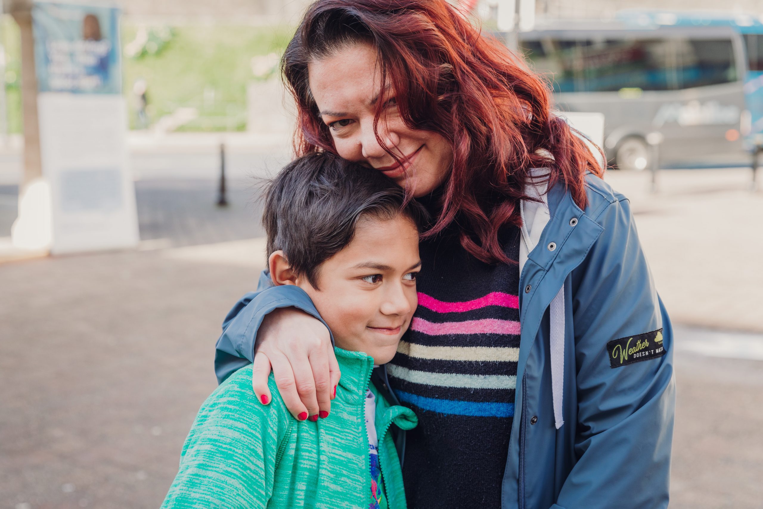 woman and young boy cuddling